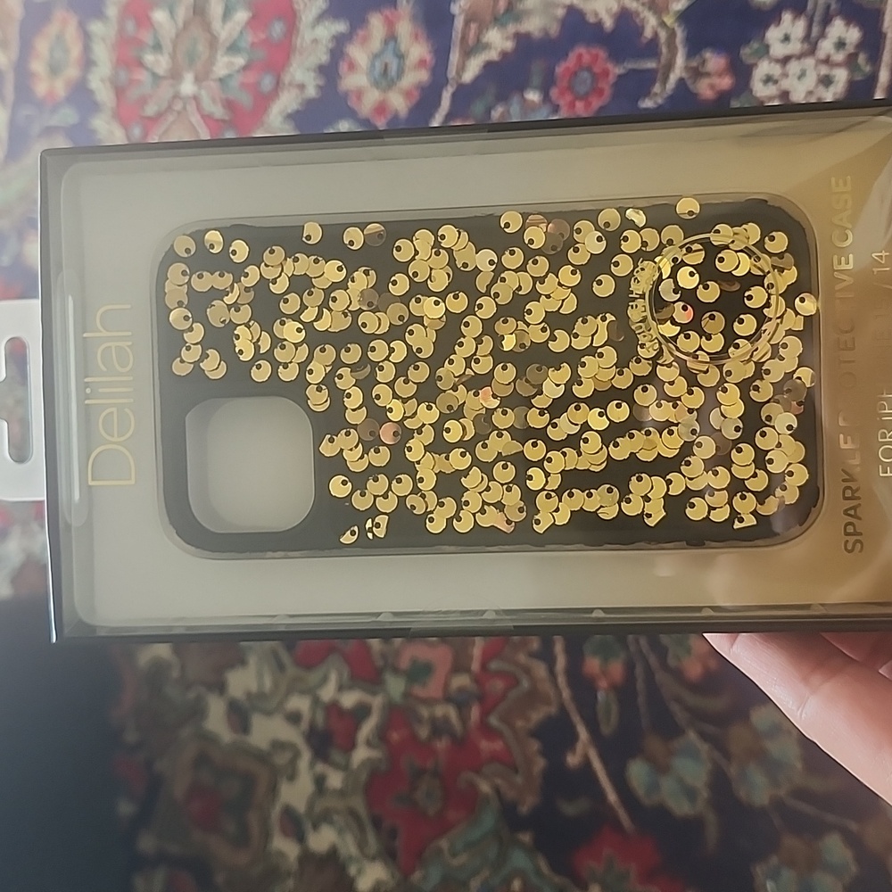 Delilah velvetvwith gold sequins cover